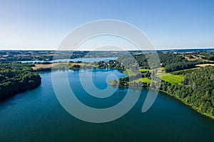Aerial view of Kashubian Landscape Park. Kaszuby. Poland. Photo made by drone from above. Bird eye view