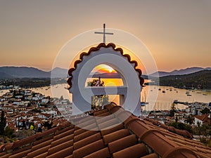 Aerial view of the Kastro mountain church and city on the island of Poros during sunset. Greece in the summer