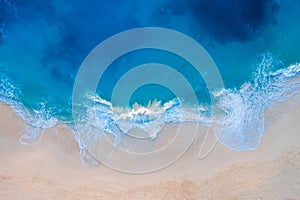 Aerial view of Kelingking Beach in Nusa Penida island, Bali in Indonesia.