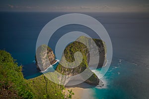 Aerial view of Kelingking cliff beach in Nusa Penida island of Bali during sunset