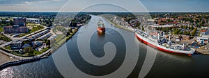 Aerial view of Kiel Canal, port of Rendsburg and camping caravan area.