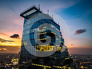 Aerial view of King Power Mahanakhon tower in Sathorn Silom central business district of Bangkok, Thailand