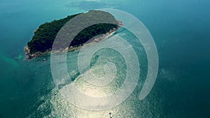 Aerial view of Ko Man near Kata beach in Phuket, Thailand. Tropical island full of trees