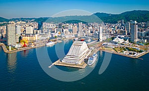 Aerial view of Kobe Port Tower under construction and downtown Sannomiya