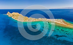 Aerial view of Kolokitha island near the town of Elounda in Crete, Greece