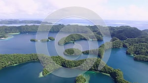 Aerial View Of Koror Island. Many Green Islets. Palau Seascape With Colorful Coral Reefs And Tropical Lagoons