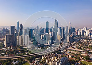 Aerial view of Kuala Lumpur Downtown, Malaysia and highways road. Financial district and business centers in smart urban city in
