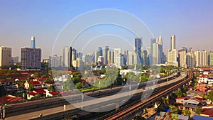 Aerial view of Kuala Lumpur Downtown, Malaysia and highways road. Financial district and business centers in smart urban city in