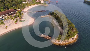 Aerial view of lagoon with blue, azure water in the middle of small islands and rocks. Shot. Beach, tropical island, sea
