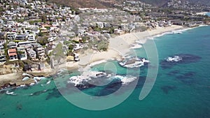 Aerial View of Laguna Beach City, California, Majestic White Sand Victoria Beach on Pacific Ocean