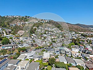 Aerial view of Laguna Beach coastline town with houses on the hills, California