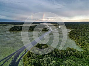 Aerial View of Lake with Double Rainbow