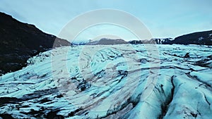 Aerial view of lake with ice rocks