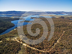 Aerial view of Lake Jindabyne and Snowy River on bright sunny da