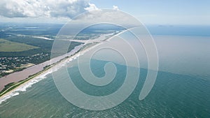 Aerial view of lake polluting beach