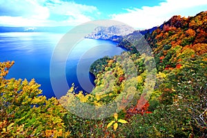 Aerial view of Lake Towada with colorful autumn foliage