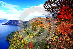 Aerial view of Lake Towada with colorful autumn foliage