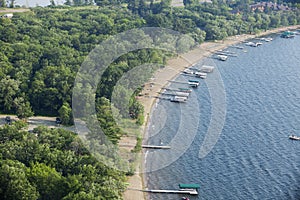 Aerial view of lakeshore with docks and boats in Minnesota