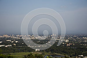 Aerial view landscape cityscape of Mae Hia city and Chiangmai capital from Wat Phra That Doi Kham or Temple of the Golden Mountain