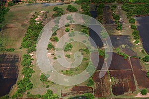 Aerial view landscape cityscape small village countryside rural with paddy rice field of Angkor Wat at SiemReap city from balloon