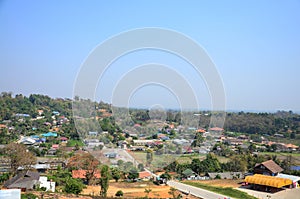 Aerial view landscape local Rim Kok village rural and Chiangrai country countryside on mountain hill of Wat Huay Pla Kang temple