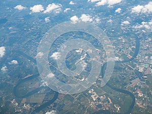 Aerial view landscape and river of perimeter Bangkok city in Thailand with cloud. View from air plane