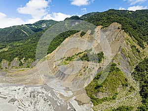 Aerial view of Landslides and rockfalls on the road in the mountains photo
