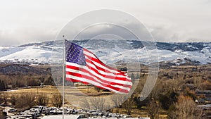 Aerial view of a Large American Flag in the Winter.