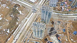 Aerial view of large construction site. Building new apartment blocks in residential area. Urban concept