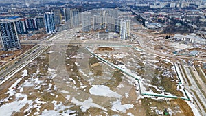 Aerial view of large construction site. Building new apartment blocks in residential area. Urban concept