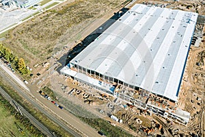 Aerial view of large construction site. industrial building or logistic center under construction