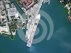 Aerial view of large cruise ship near the pier