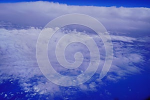 Aerial view of a large and fluffy Cumulonimbus Thunderstorm Cloud