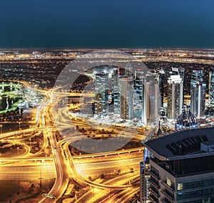 Aerial view of large highway junction in Dubai, UAE, at night