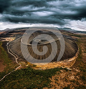 Large Hverfjall volcano crater is Tephra cone or Tuff ring volcano on gloomy day in Myvatn area at Iceland photo