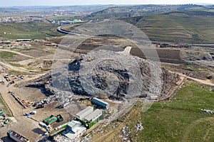 Aerial view of large landfill. Waste garbage dump, environmental pollution
