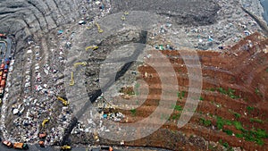 Aerial View. Large landfills like mountains. the tractor take garbage on landfills at Bekasi - Indonesia