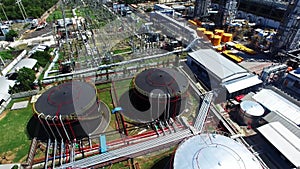 Aerial view of a large, modern oil refinery with oil storage tanks. Petroleum industry, gasoline and diesel production