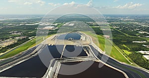 Aerial view of large open air phosphogypsum waste stack near Tampa, Florida. Potential danger of disposing byproduct of