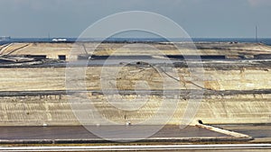 Aerial view of large open air phosphogypsum waste stack near Tampa, Florida. Potential danger of disposing byproduct of