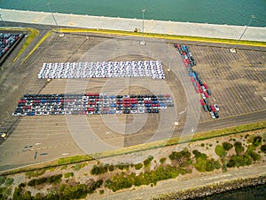 Aerial view of large parking lot with new imported cars in Port Melbourne, Australia.