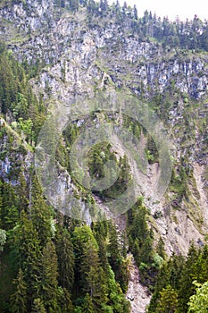 Aerial view of the large stone mountains in the Alps