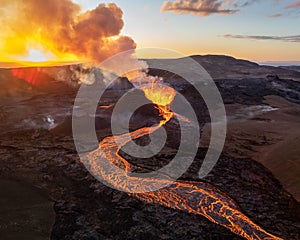 Aerial view of lava pouring out of an erupting volcano in Iceland