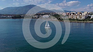 Aerial view of leisure yacht near Playa de Cristo beach in Estepona, Spain