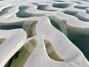 Aerial view of Lencois Maranhenses. White sand dunes with pools of fresh and transparent water. Desert. Brazil photo