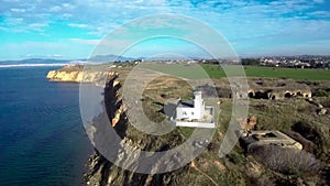 Aerial view of lighthouse on a cape