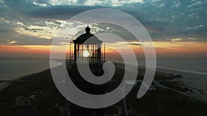 Aerial View of a Lighthouse Close Up on a Easter Sunday SunRise
