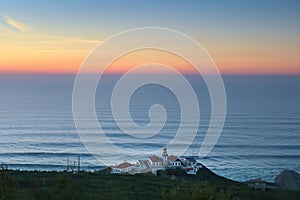 Aerial view of lighthouse and ocean