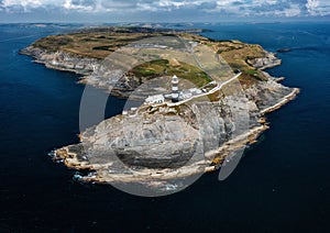 Aerial view of the lighthouse and the Old Head of Kinsale in County Cork of western Ireland