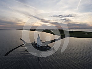 Aerial view of lighthouse on peninsula in the Netherlands